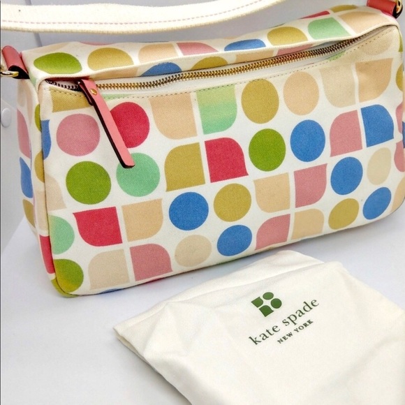 kate spade Handbags - Small Kate spade hand bag NWOT but with dust bag